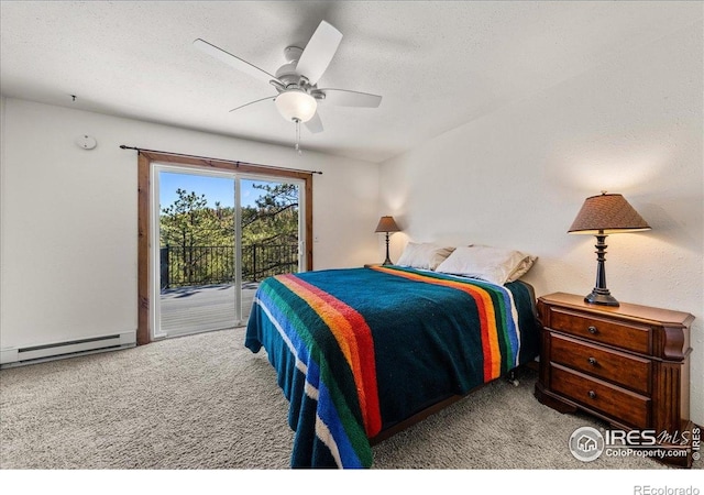 457 Spruce Mountain Dr, Drake, CO 80515 - carpeted bedroom with access to exterior, baseboard heating, and a ceiling fan