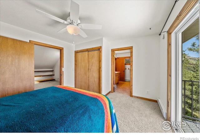 457 Spruce Mountain Dr, Drake, CO 80515 - carpeted bedroom with baseboard heating, baseboards, a closet, a ceiling fan, and a baseboard radiator