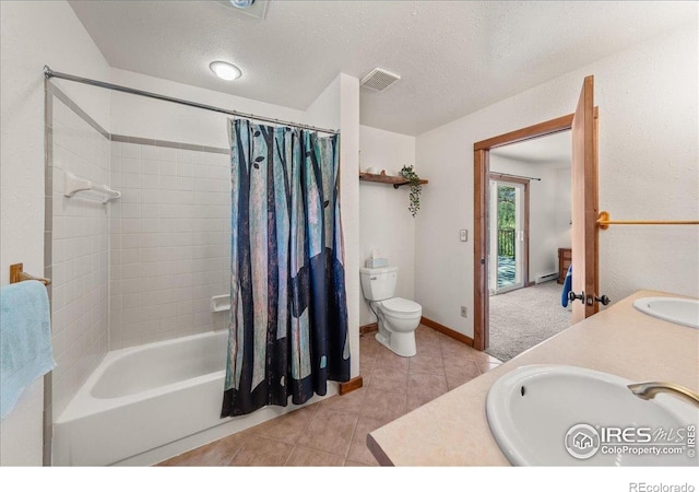 457 Spruce Mountain Dr, Drake, CO 80515 - full bath featuring toilet, shower / bathtub combination with curtain, a textured ceiling, tile patterned flooring, and double vanity