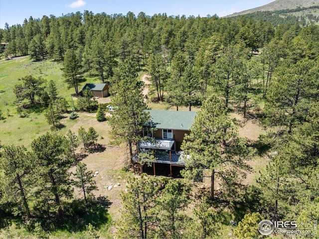 457 Spruce Mountain Dr, Drake, CO 80515 - view of subject property featuring a heavily wooded area