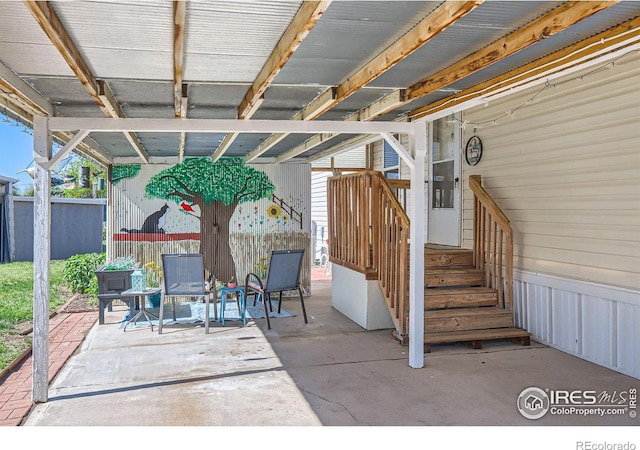 view of patio / terrace with fence
