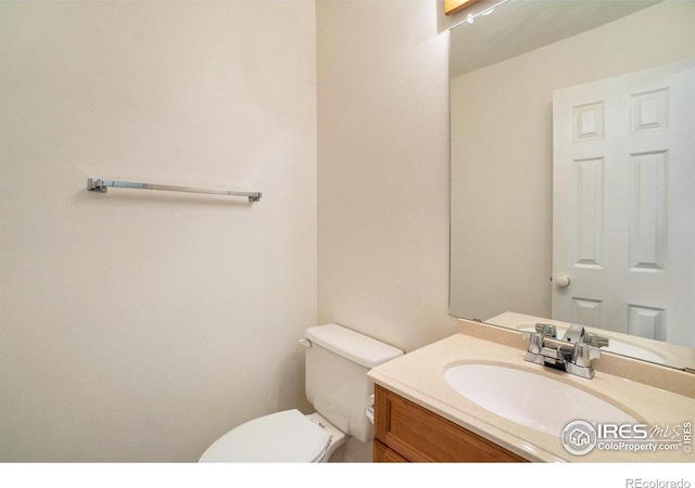 2066 Weathertop Ln, Fort Collins, CO 80526 - half bathroom with toilet and vanity