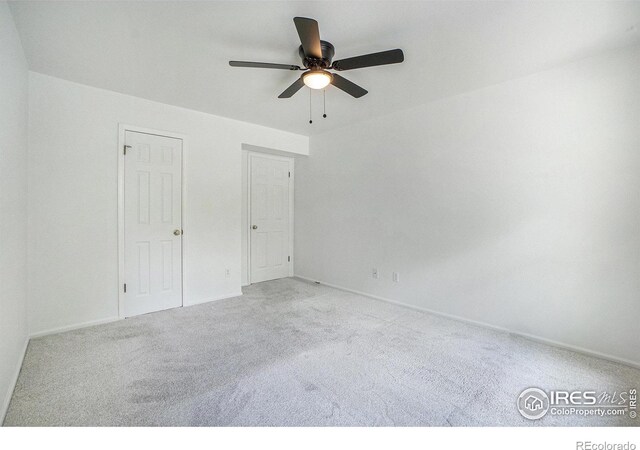 2066 Weathertop Ln, Fort Collins, CO 80526 - unfurnished bedroom featuring carpet, baseboards, and ceiling fan