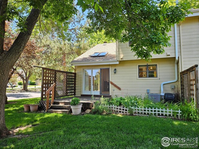 2066 Weathertop Ln, Fort Collins, CO 80526 - rear view of property with a shingled roof