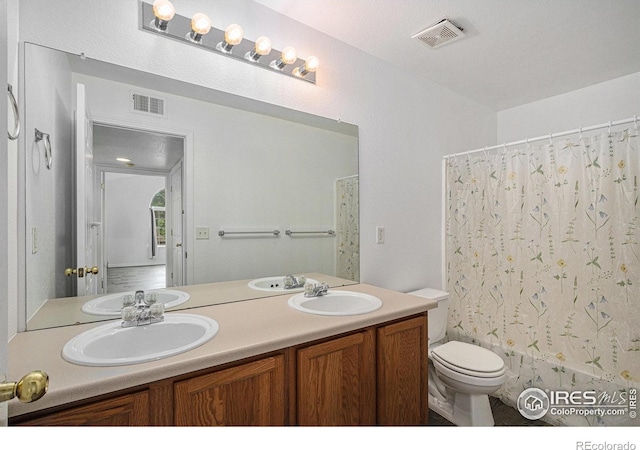 3002 W Elizabeth St Unit G, Fort Collins, CO 80521 - bathroom with toilet and double vanity