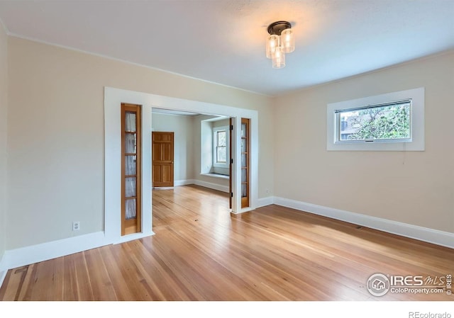 3116 47th St, Boulder, CO 80301 - empty room with light wood-type flooring and baseboards