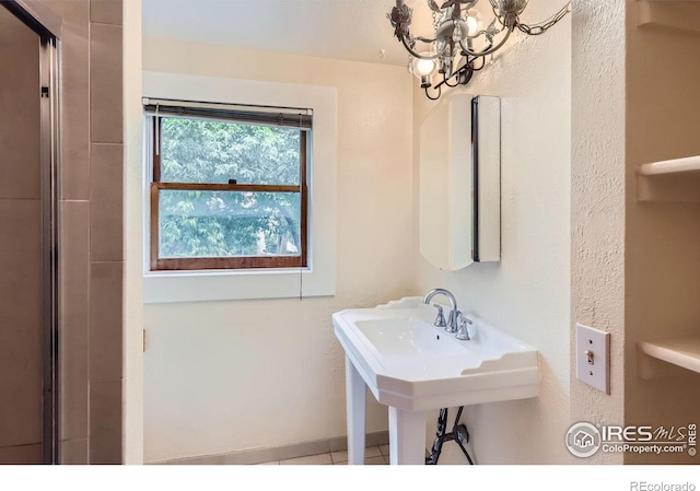 3116 47th St, Boulder, CO 80301 - full bath with a chandelier and a shower with shower door