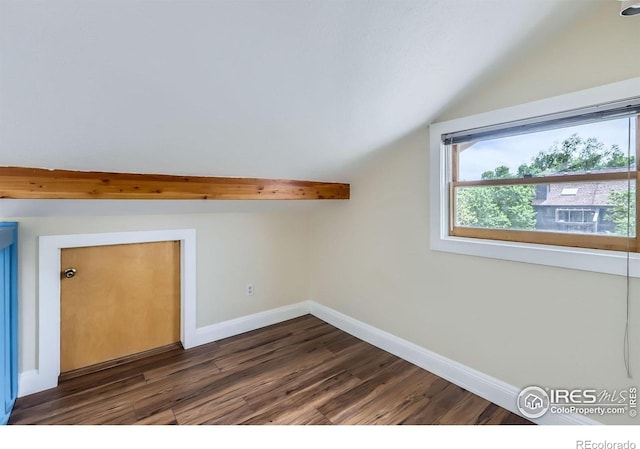3116 47th St, Boulder, CO 80301 - additional living space featuring vaulted ceiling, dark wood-style floors, and baseboards