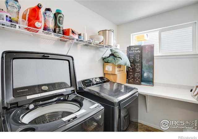 7505 Little Fox Ln, Wellington, CO 80549 - clothes washing area with washer and dryer