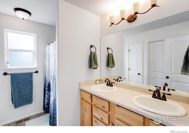 7505 Little Fox Ln, Wellington, CO 80549 - bathroom with double vanity