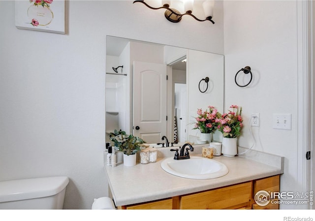 7505 Little Fox Ln, Wellington, CO 80549 - bathroom with toilet and vanity