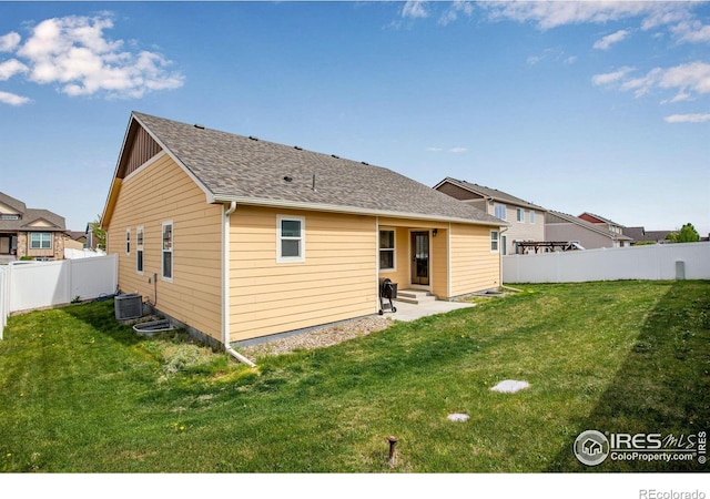 7505 Little Fox Ln, Wellington, CO 80549 - back of house featuring roof with shingles, a patio, and central AC unit