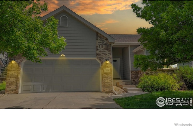 374 Blue Azurite Ave, Loveland, CO 80537 - single story home featuring brick siding and concrete driveway