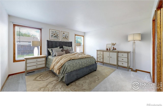 374 Blue Azurite Ave, Loveland, CO 80537 - carpeted bedroom featuring baseboards