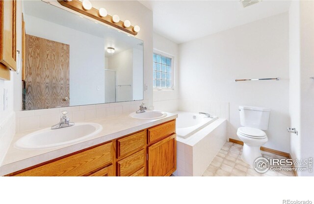 374 Blue Azurite Ave, Loveland, CO 80537 - full bathroom featuring toilet, a garden tub, double vanity, and a shower with shower door