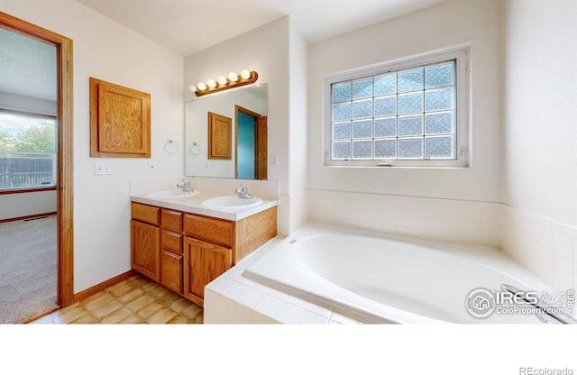 374 Blue Azurite Ave, Loveland, CO 80537 - full bath with a bath and double vanity