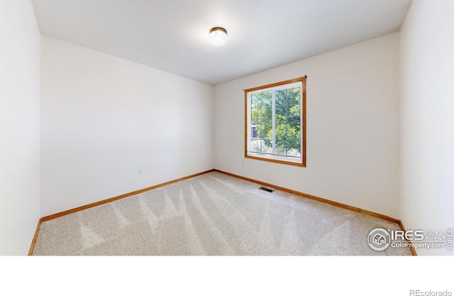 374 Blue Azurite Ave, Loveland, CO 80537 - unfurnished room featuring carpet flooring and baseboards