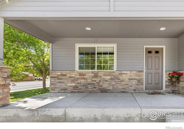 1918 Lily Dr, Loveland, CO 80537 - view of exterior entry with stone siding