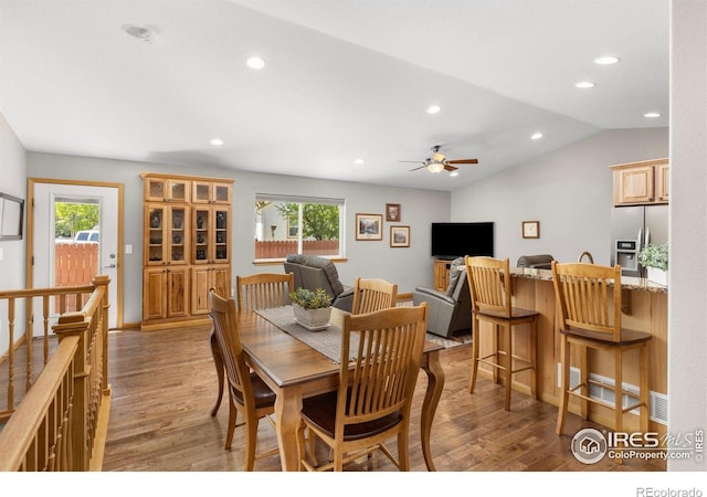 1918 Lily Dr, Loveland, CO 80537 - dining space with light wood-type flooring, recessed lighting, lofted ceiling, and a ceiling fan