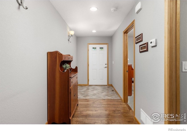 1918 Lily Dr, Loveland, CO 80537 - entryway featuring light wood-style floors, recessed lighting, and baseboards