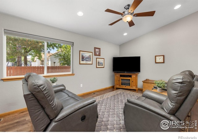 1918 Lily Dr, Loveland, CO 80537 - living area featuring ceiling fan, baseboards, vaulted ceiling, recessed lighting, and wood finished floors