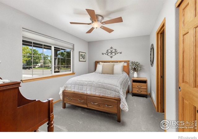 1918 Lily Dr, Loveland, CO 80537 - bedroom featuring carpet flooring, baseboards, and a ceiling fan