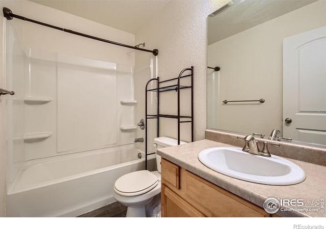 4134 Cypress Ridge Ln, Wellington, CO 80549 - bathroom with toilet, vanity, bathtub / shower combination, and wood finished floors