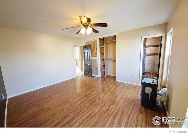 110 Lucerne Dr, Lafayette, CO 80026 - unfurnished bedroom with light wood-type flooring, a closet, baseboards, and ceiling fan