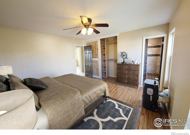 110 Lucerne Dr, Lafayette, CO 80026 - bedroom with wood finished floors, a closet, and ceiling fan