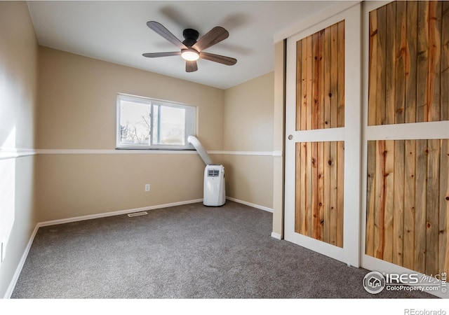 110 Lucerne Dr, Lafayette, CO 80026 - unfurnished bedroom with carpet flooring, baseboards, and a ceiling fan