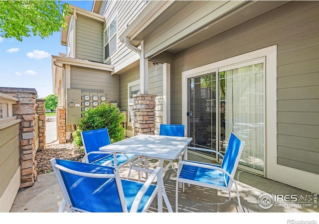 view of patio with outdoor dining area