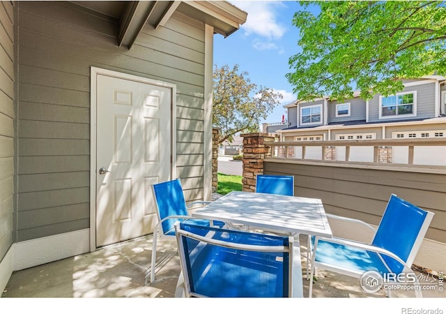 view of patio with outdoor dining area