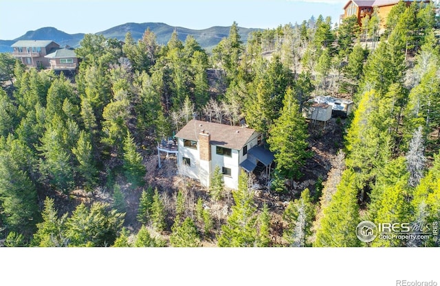 33090 Janelle Cir, Golden, CO 80403 - aerial view of property and surrounding area featuring a mountainous background