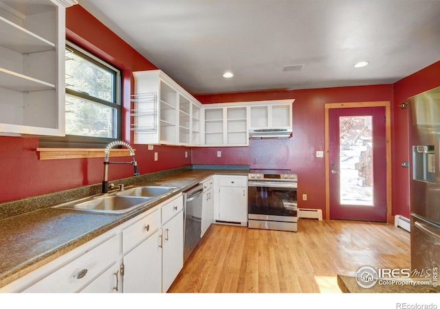 33090 Janelle Cir, Golden, CO 80403 - kitchen featuring open shelves, stainless steel appliances, a sink, a baseboard heating unit, and under cabinet range hood