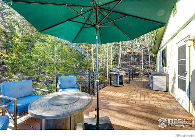 33090 Janelle Cir, Golden, CO 80403 - wooden terrace featuring grilling area