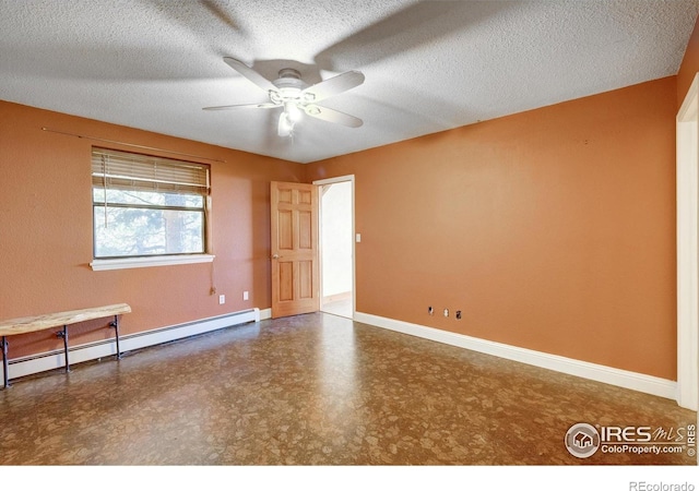 33090 Janelle Cir, Golden, CO 80403 - unfurnished room with a baseboard heating unit, a ceiling fan, baseboards, and a textured ceiling
