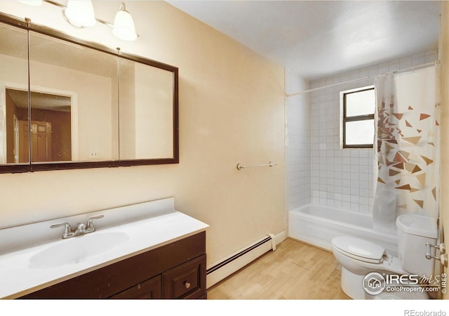 33090 Janelle Cir, Golden, CO 80403 - full bathroom featuring a baseboard heating unit, toilet, wood finished floors, vanity, and shower / bath combo