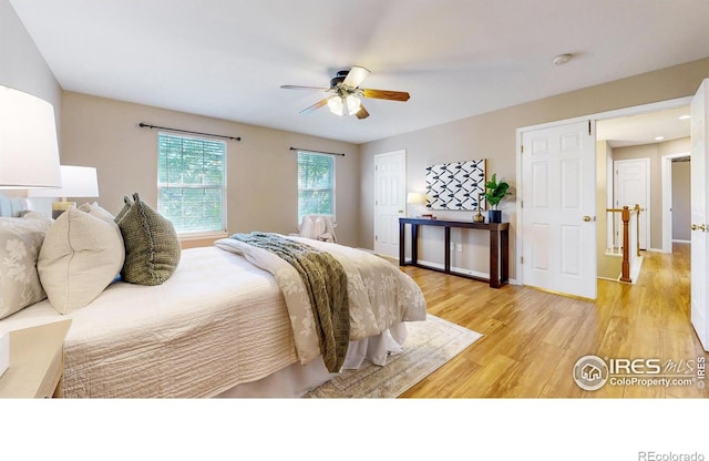 3221 Mesa Verde St, Fort Collins, CO 80525 - bedroom with light wood-style floors, ceiling fan, and baseboards