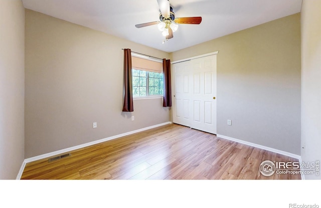 3221 Mesa Verde St, Fort Collins, CO 80525 - unfurnished bedroom with wood finished floors, a closet, baseboards, and a ceiling fan