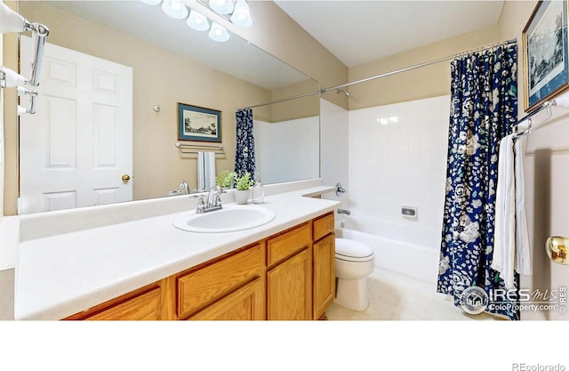3221 Mesa Verde St, Fort Collins, CO 80525 - bathroom featuring vanity, shower / tub combo with curtain, toilet, and tile patterned flooring