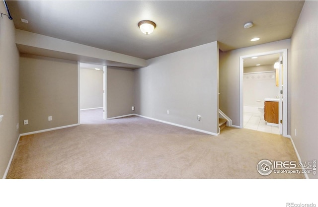 3221 Mesa Verde St, Fort Collins, CO 80525 - carpeted empty room with baseboards, recessed lighting, a smoke detector, and stairway