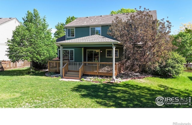 3221 Mesa Verde St, Fort Collins, CO 80525 - view of front of house with a wooden deck and roof with shingles