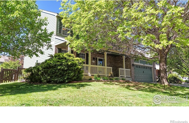 3221 Mesa Verde St, Fort Collins, CO 80525 - view of property hidden behind natural elements with brick siding, covered porch, and a front yard