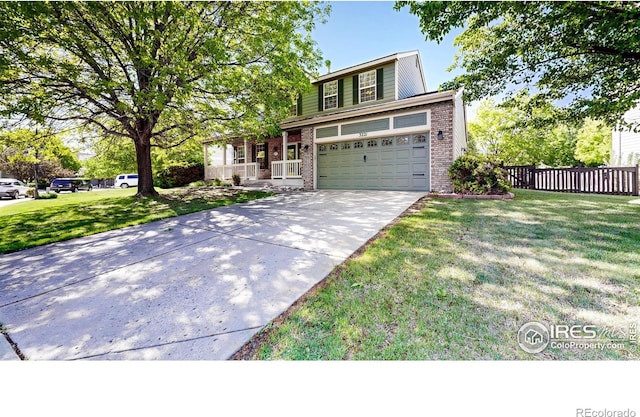 3221 Mesa Verde St, Fort Collins, CO 80525 - traditional-style house featuring brick siding, concrete driveway, covered porch, and an attached garage