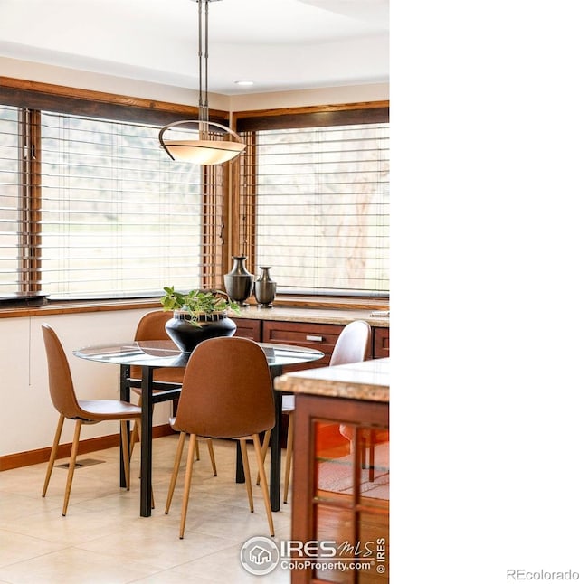990 Utica Cir, Boulder, CO 80304 - dining area featuring baseboards