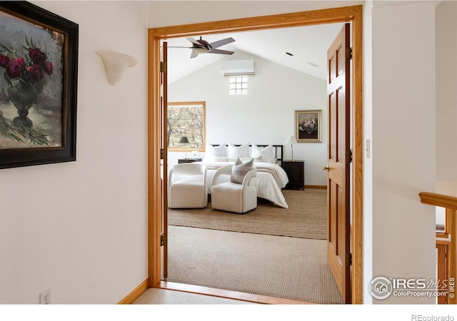 990 Utica Cir, Boulder, CO 80304 - carpeted bedroom with vaulted ceiling, a wall mounted air conditioner, and baseboards