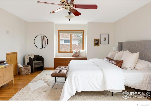 990 Utica Cir, Boulder, CO 80304 - bedroom featuring wood finished floors and a ceiling fan