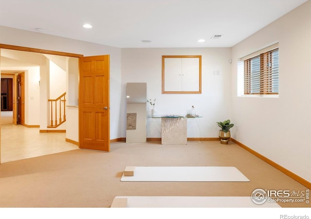 990 Utica Cir, Boulder, CO 80304 - carpeted spare room featuring stairway, baseboards, and recessed lighting