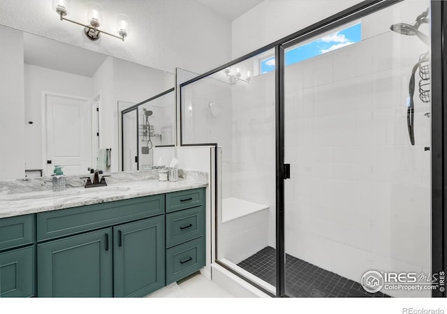 5524 Congressional Ct, Windsor, CO 80528 - bathroom featuring a stall shower and vanity