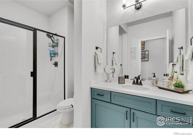 5524 Congressional Ct, Windsor, CO 80528 - full bathroom with a shower stall, toilet, and vanity